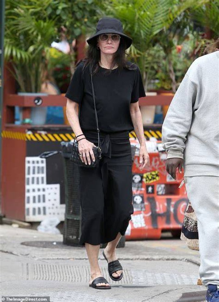 Cute dress:&nbsp;The Friends alum, 59, looked chic in a summery black midi dress with a dropped waist and short sleeves